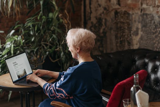 elderly woman writing in a journal