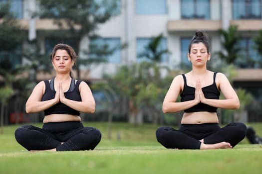 women practicing yoga outdoors