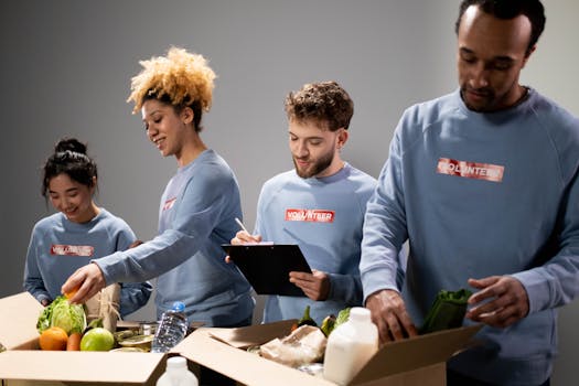 a group of volunteers helping at a food bank