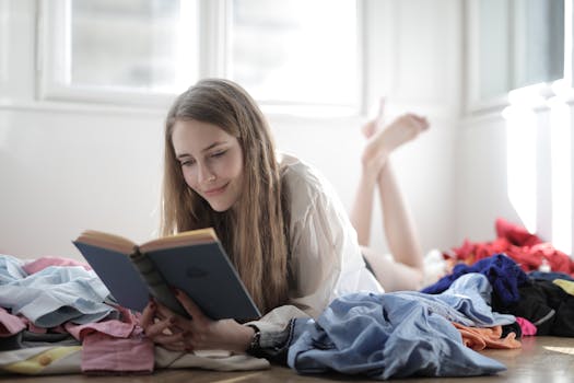 a woman relaxing with a book in a cozy setting