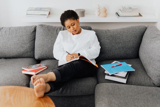 a woman journaling in a peaceful setting