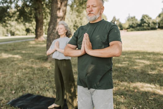 a woman practicing yoga in a park