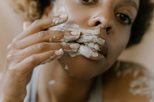 mature woman applying a face mask