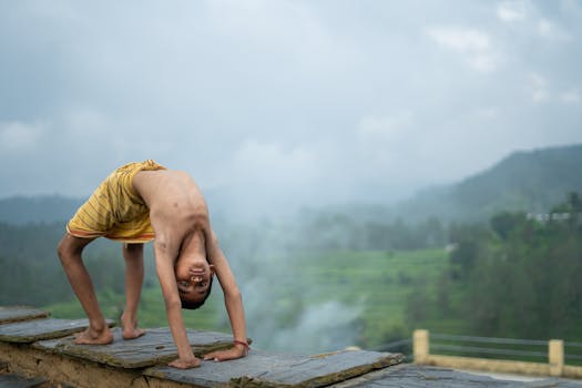 woman practicing yoga outdoors