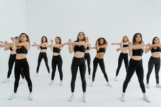 group of women practicing yoga together