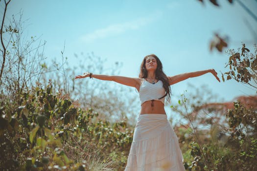 a woman meditating in a serene environment