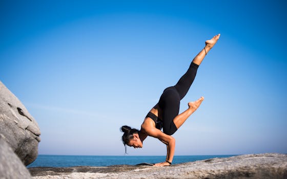 woman practicing yoga outdoors