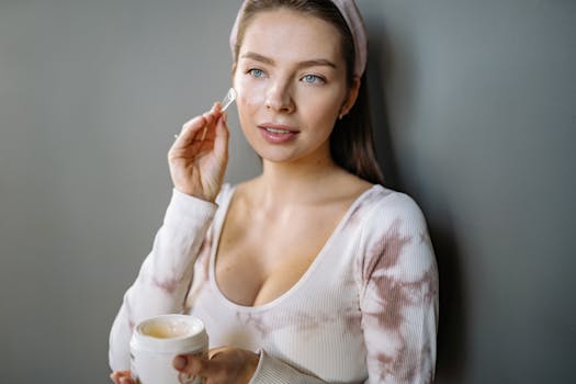 woman applying serum