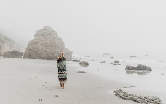 image of a woman enjoying a peaceful nature walk