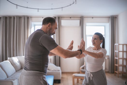 joyful older women exercising at home